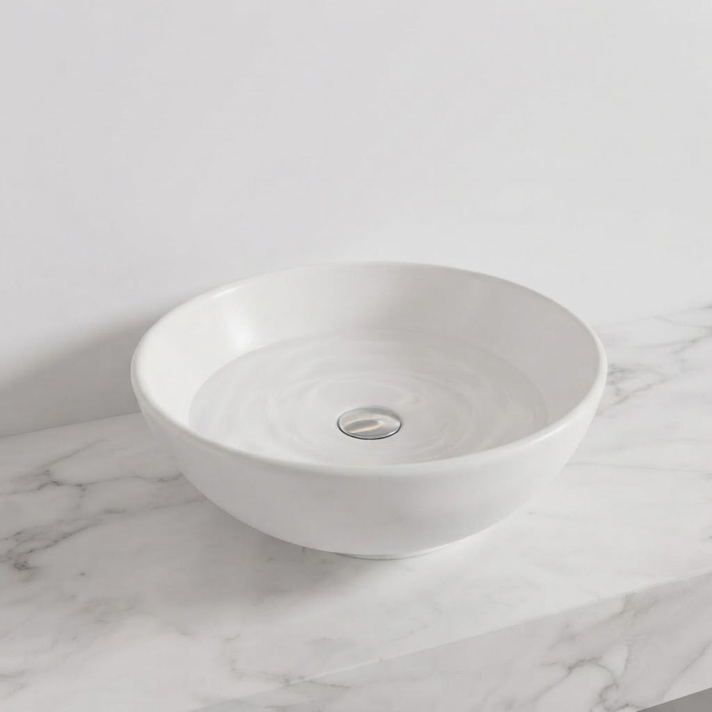 Cella, vasque ronde compacte en céramique blanche