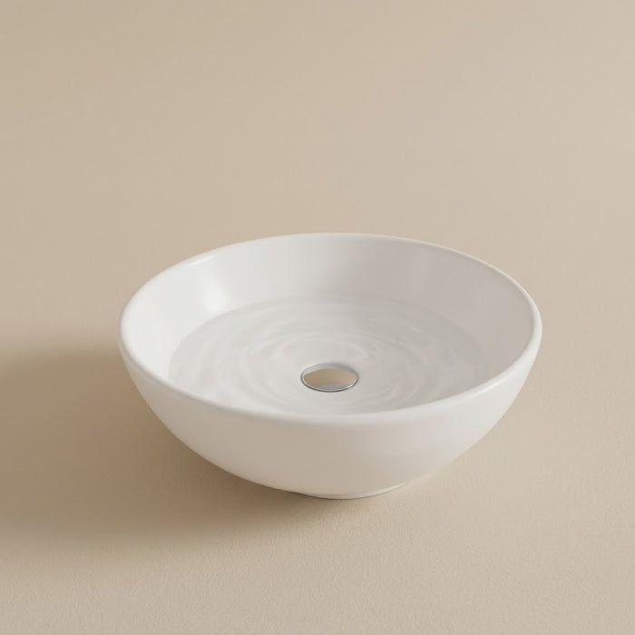 Cella, vasque ronde compacte en céramique blanche